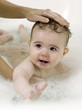 Baby girl taking a bath