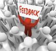 Feedback Man Holding Sign in Crowd Sharing Opinion