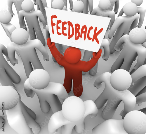 Illustration: Feedback Man Holding Sign in Crowd Sharing Opinion Feedback Man Holding Sign in Crowd Sharing Opinion