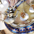 Pouring moroccan tea from teapot