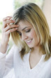 Woman smiling while looking down