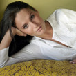 Woman lying down posing for the camera