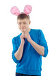 Adult guy with rabbit ears on a white background