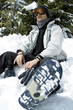 Man sitting on snowy ground