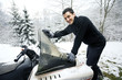 Man riding on snowmobile