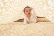 Photo: Baby girl under sheet Baby girl under sheet