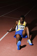 Man sitting on the running track