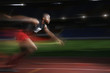 Man running at a fast speed on the running track