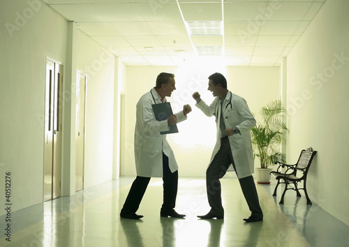 Photo: Doctors fighting playfully Doctors fighting playfully