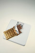 Photo: Bar of chocolate on a weight scale Bar of chocolate on a weight scale