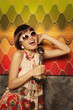 Woman singing into vintage microphone