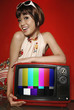 Woman posing with television