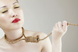 Woman holding noose around her neck