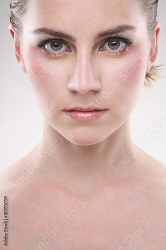Photo: Close-up of a woman's face with make-up Close-up of a woman's face with make-up