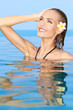 Adorable girl in the swiming pool