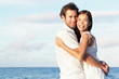 Happy young couple on beach