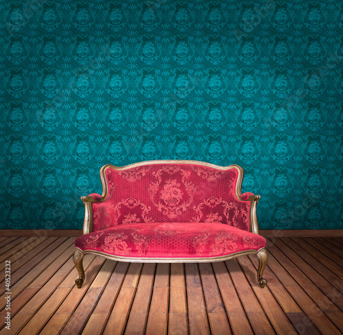 Photo: vintage red luxury armchair and in blue wallpaper room vintage red luxury armchair and in blue wallpaper room