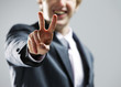 Foto: young businessman hand showing the victory sign. young businessman hand showing the victory sign.