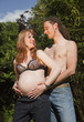 Young Couple flirting and awaiting a Baby