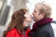 Romantic couple in love kissing outdoors