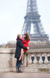 Romantic couple in love dating near the Eiffel Tower
