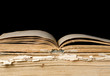 Pile of old books on black