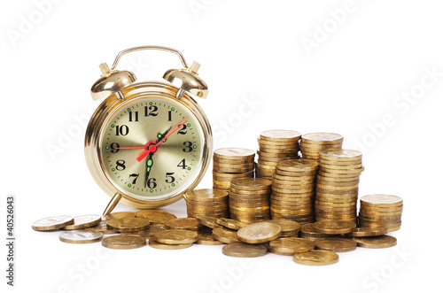 Photo: Alarm clock and money isolated on white background Alarm clock and money isolated on white background