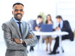 Happy african-american businessman with his team
