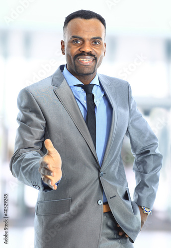 Photo: Portrait of a handsome successful business man Portrait of a handsome successful business man