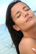 Portrait of woman enjoying the sun at the beach