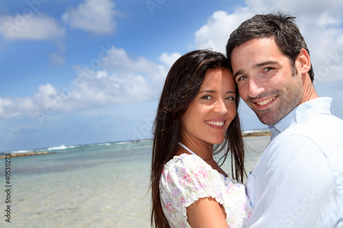 Photo: Closeup of happy couple on honeymoon travel Closeup of happy couple on honeymoon travel