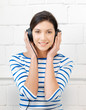 happy teenage girl in big headphones