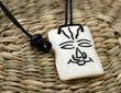 wooden african amulet