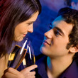 Couple with glasses of champagne on date