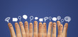 Group of finger smileys with social chat sign and speech bubbles