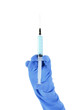 Hand in glove with medical syringe. Hand in glove with medical syringe.