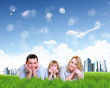 Collage with children and parents on green grass
