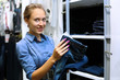 Young girl buying clothes