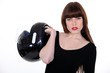 Attractive woman carrying a motorcycle helmet Attractive woman carrying a motorcycle helmet