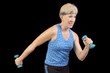 Attractive baby-boomer exercising with weights
