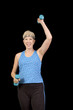 Attractive baby-boomer exercising with weights
