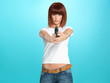 pretty young woman pointing the gun