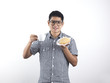 Indian Man holding Asian Pastry and cup