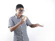 Photo: Indian Man Happy with his pastry Indian Man Happy with his pastry