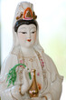 Kuan Yin image of buddha , Wood carving in a thai temple Kuan Yin image of buddha , Wood carving in a thai temple