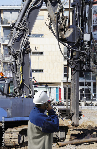 Photo: heavy machinery and building worker, building-machinery heavy machinery and building worker, building-machinery