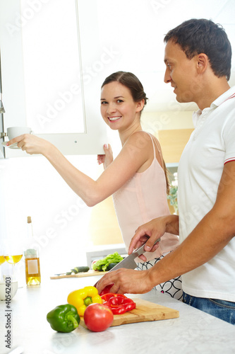 Photo: Couple in the kitchen Couple in the kitchen