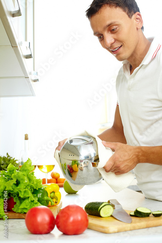 Photo: Man with pan Man with pan