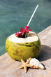 coconut drink and sea