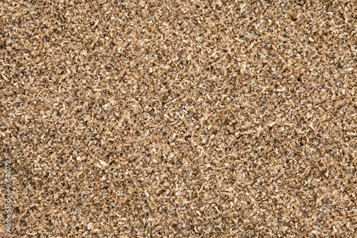 Photo: Ground Coriander (Coriandrum sativum) background. Ground Coriander (Coriandrum sativum) background.
